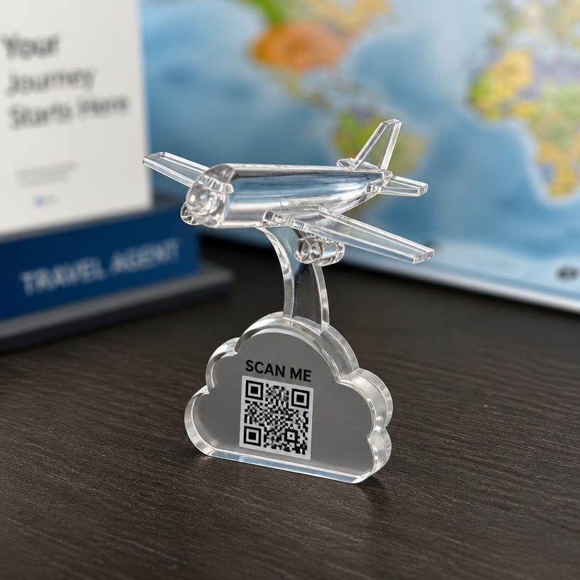 Miniature airplane with a SCAN ME QR base